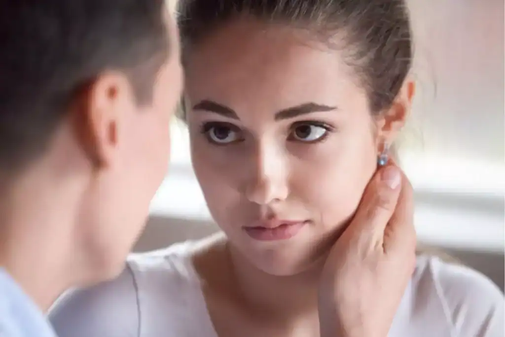 Hope restored in this couple's marriage as this young wife looks into her husband's eyes with trust.
